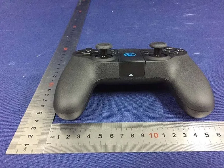 The GameSir T1d from the front: a dark grey gamepad with two analogue sticks, a D-pad and four face buttons